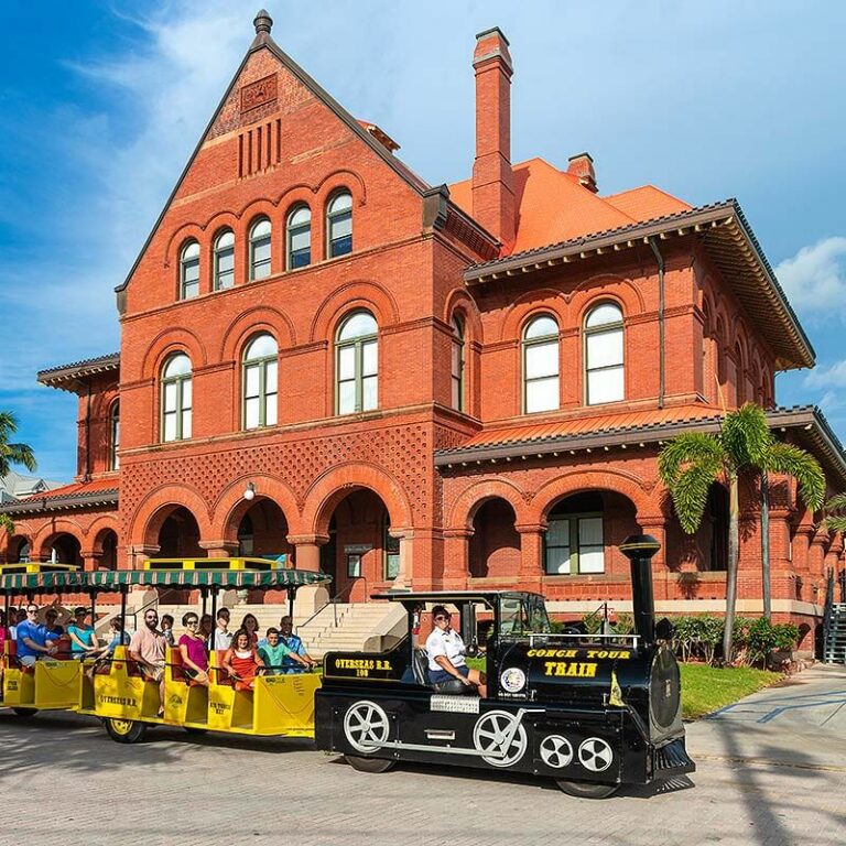 Conch Tour Train in front of Key West Custom House