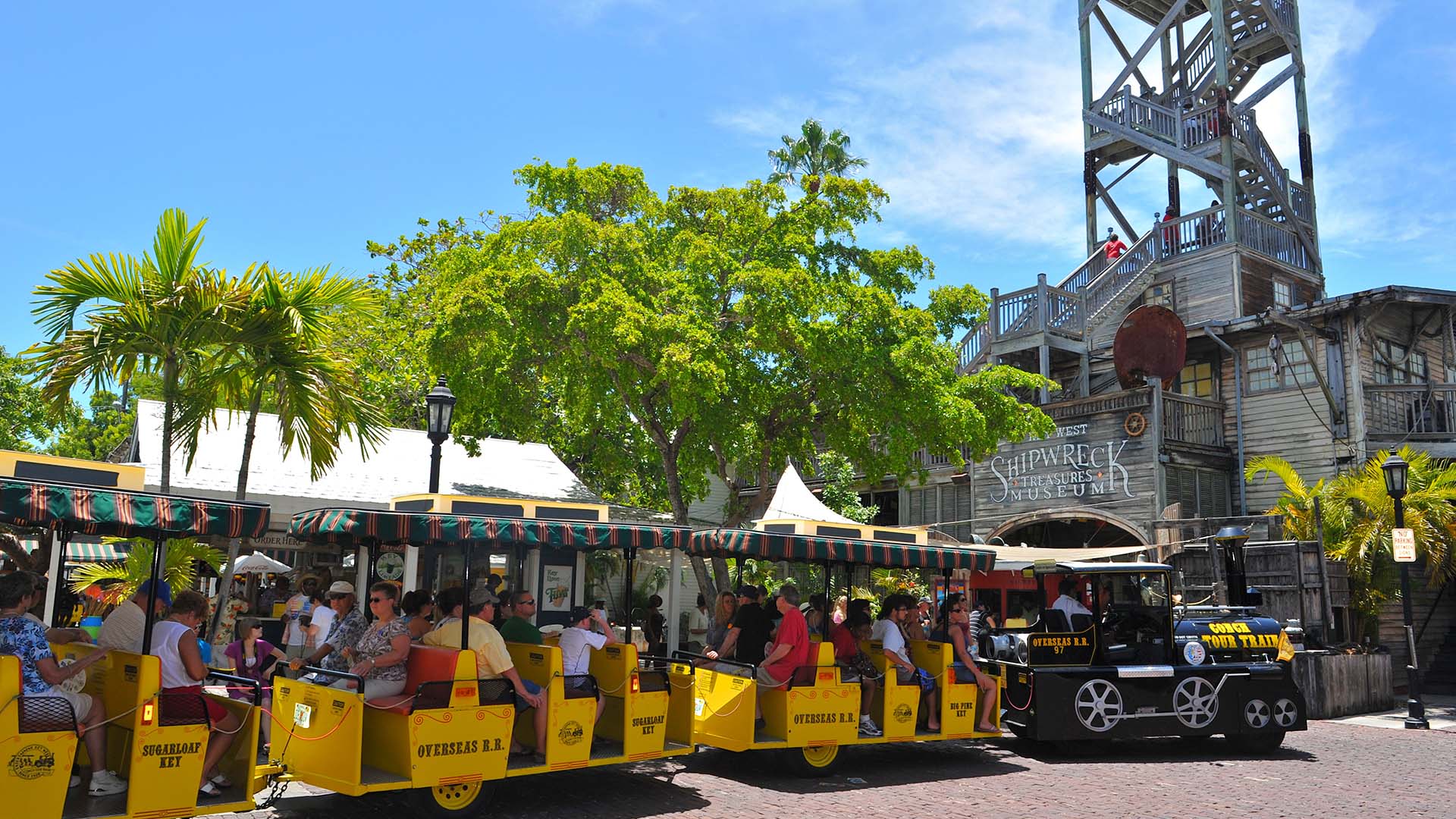conch tour train infront of the key west shipwreck museum